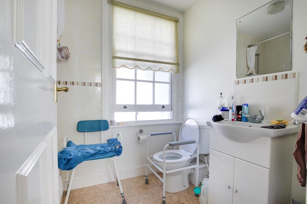 Lot: 99 - TWO-BEDROOM FLAT IN GOOD LOCATION - Shower room with W.C.